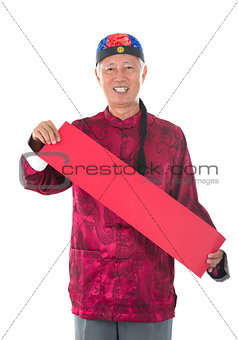 asian  senior chinese man celebrating lunar new year, holding lu