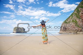 open arms woman in Ballota beach