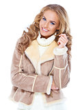 Cute woman wearing modern winter fur jacket