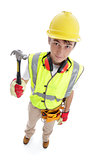 Builder standing with hammer