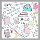 School supplies elements on lined sketchbook paper background