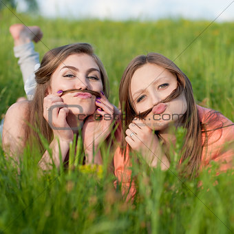 Two happy teenage girl friends