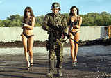 Soldier and two women