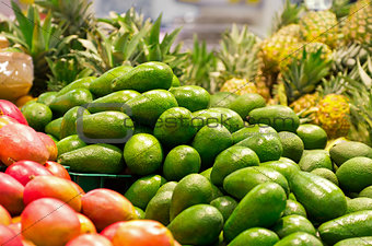 Full box of green Avocado in supermarket