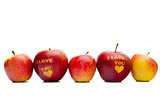 apple with the words "I love you" arranged in a row