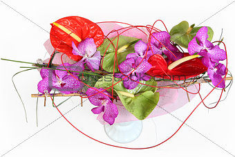 Composition with orchids and florist anthurium