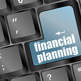 keyboard with blue financial planning button