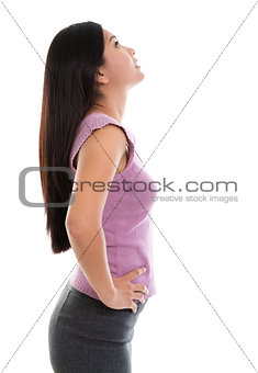 Asian young woman looking up