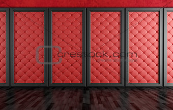  empty room with red upholstered panels 
