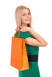 Beautiful blond woman holding shopping bag