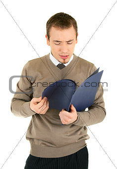 Puzzled young manager with documents