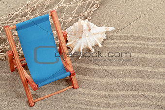 Still Life with seashell and sun lounger