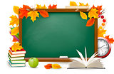 Back to school. Green desk with school supplies and autumn leaves. Vector.