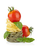 Fettuccine nest pasta with tomato cherry and basil