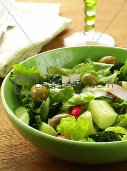 salad with tomato cucumbers and  green olive
