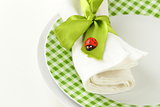 Spring Easter table setting with green ribbon