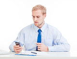 young man at office with mobile phone