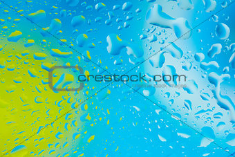Water droplets on blue and green abstract background