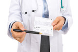 Closeup on medical doctor woman pointing on prescription