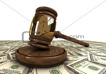 Judge's gavel standing on a dollars