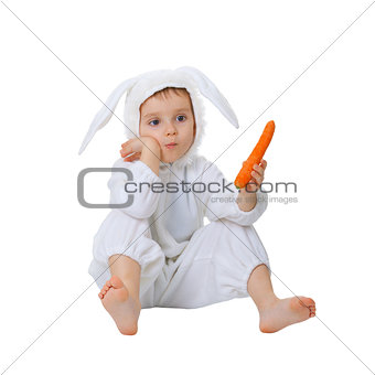 Child dressed as a rabbit with a carrot