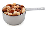 Mixed nuts presented in an American metal cup measure