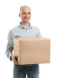 Young man holding cardboard box