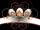 Ornamented Easter eggs on black background