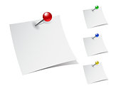 set of note papers with push pins on white background.