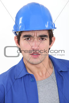 Concerned construction worker
