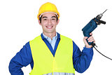 Construction worker holding a power tool