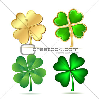 Set of four-leaf clovers isolated on white.