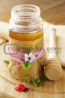 Natural organic flower honey in the pot