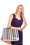 Beautiful blond woman holding shopping bags