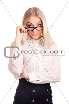 Young woman loooking over glasses