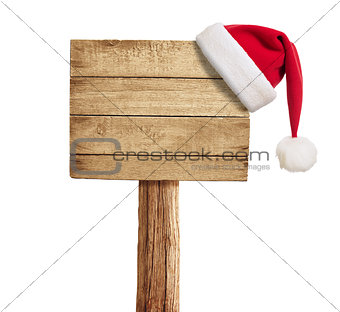wooden signboard with Christmas hat isolated on white