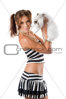 Pretty young woman with little rabbit
