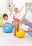 Healthy life concept with exercising people