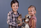 Beautiful kids with their lovely pets