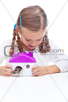 Little girl and her hamster