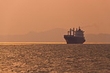 freighter under sunset