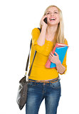 Happy student girl speaking mobile