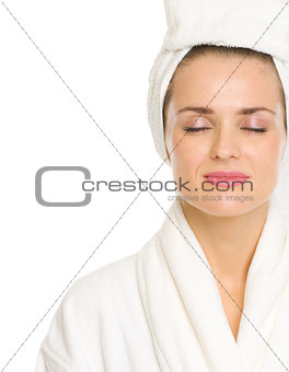 Portrait of young woman in bathrobe