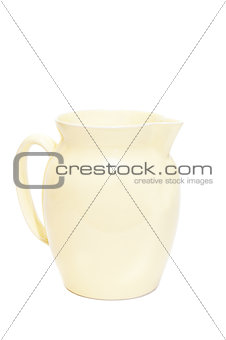 Isolated yellow crock with handle on white