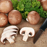 Preparing food: Sliced brown mushrooms