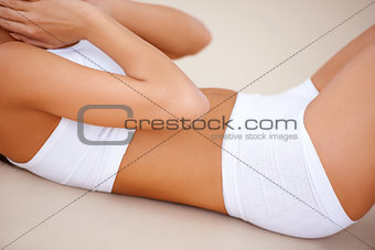 Body part of a exercising woman