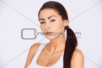 Brunette woman with ponytail haircut