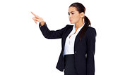 Business woman pointing at empty space