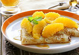"crêpes suzette"  pancakes with orange and sweet sauce