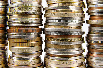 Various coins arranged in stacks